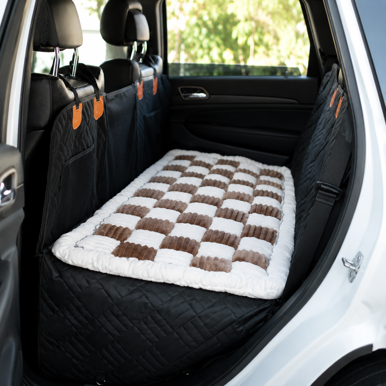 The Wagvora Plush Back Seat Travel Bed laid over the Wagvora Back Seat Extender in a car
